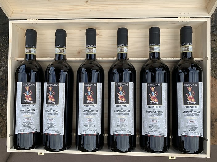 Bottles of Il Palazzone's Brunello in a wooden box