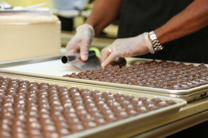 David Griffin with handmade chocolate at Chocolate Therapy